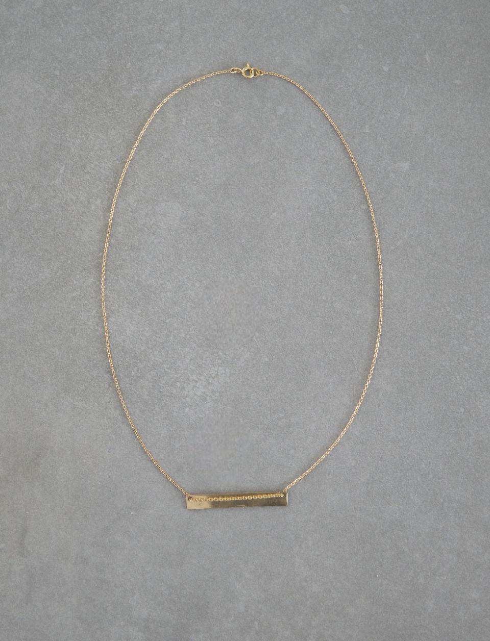 Collier avec une chaine et une plaque en Gold Filled