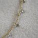 Bracelet fin sur cordon avec des perles doré/argenté