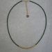 collier ras de cou en pierres vertes
