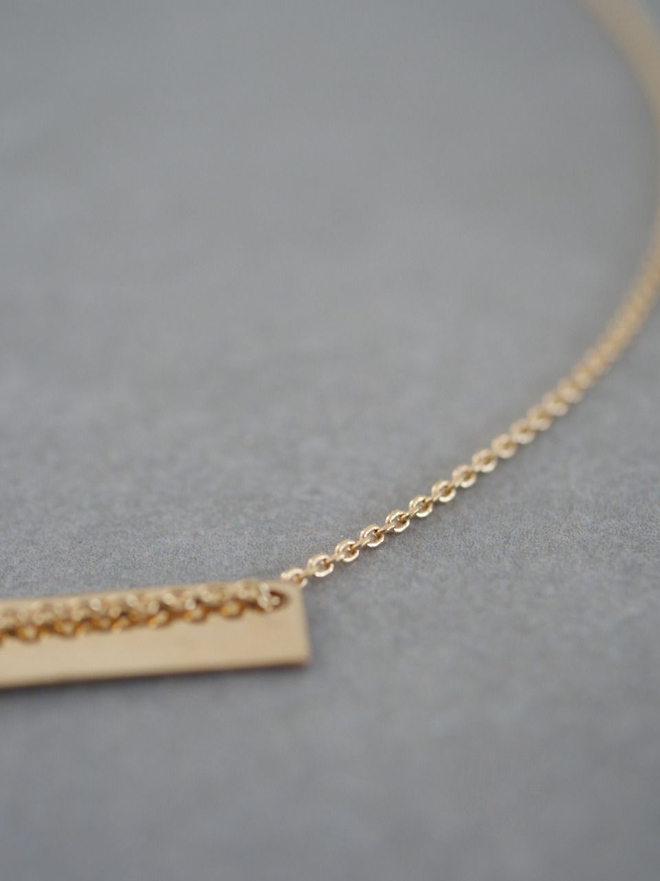 Collier avec une chaine et une plaque en Gold Filled