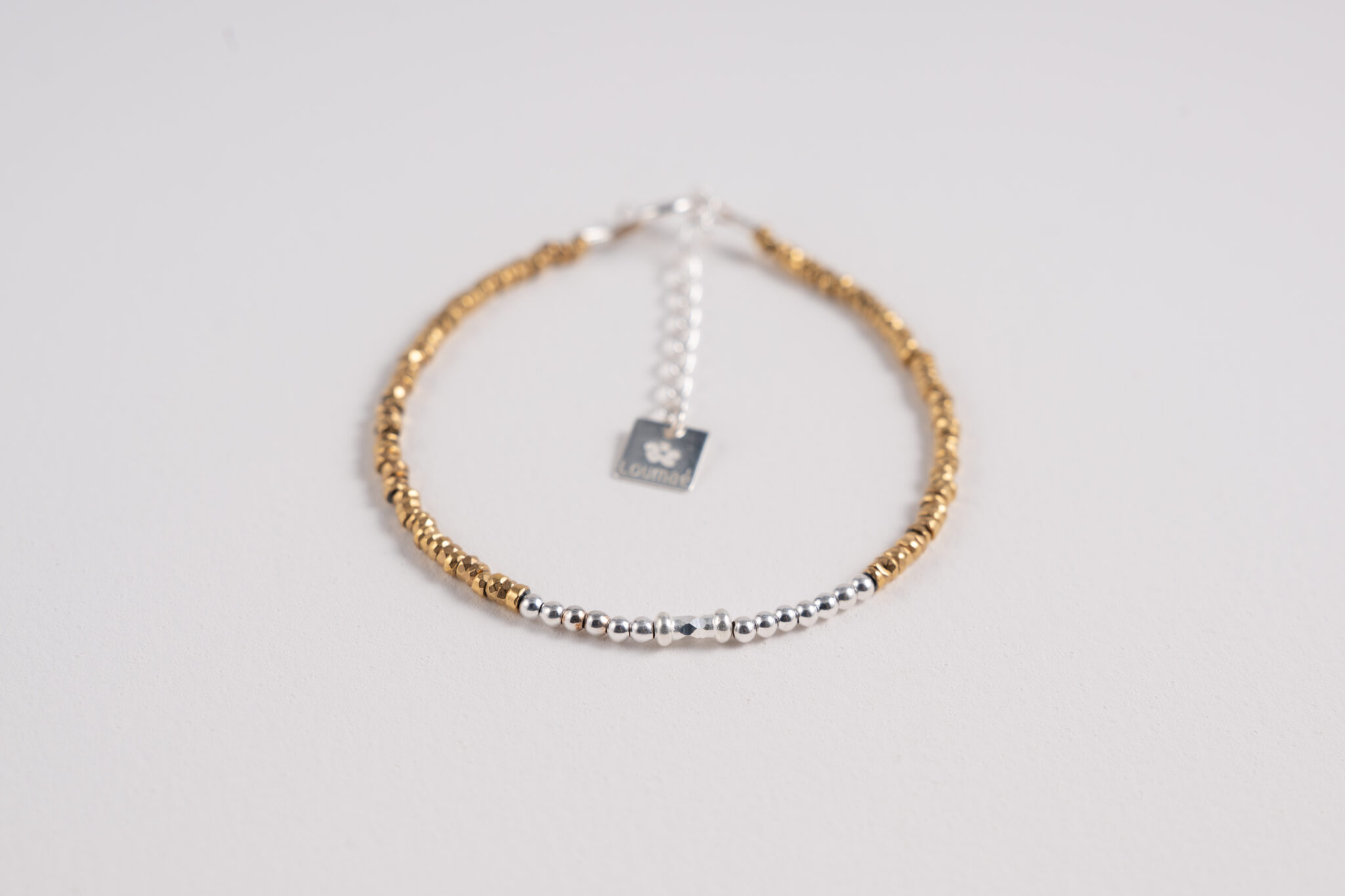 Bracelet fin femme en hématite dorée et argent 925