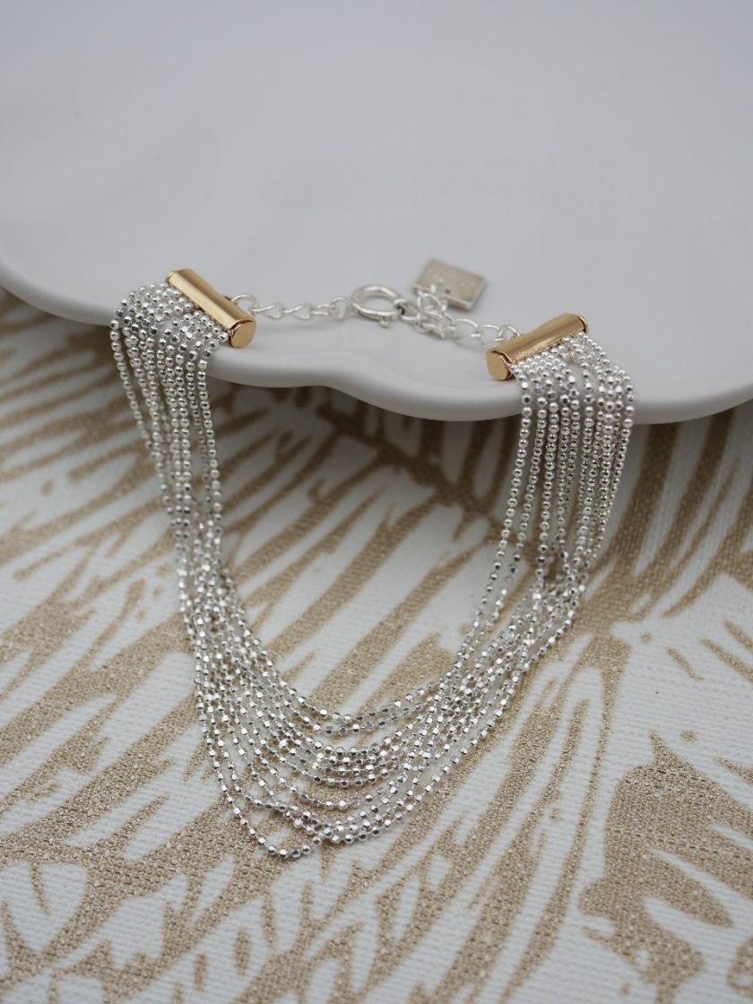 Collier long plaqué or et pierres semi précieuses porte bonheur